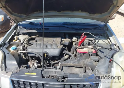 2009 Nissan Sentra 2.0S from USA, damaged, VIN 3N1AB61E29L628088